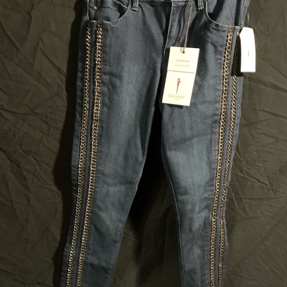 Skinny girl jeans with leather and chain sides